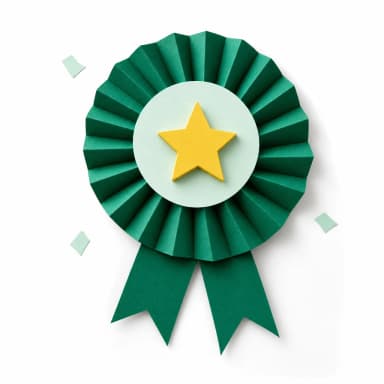 A green paper rosette celebrates a completed project.